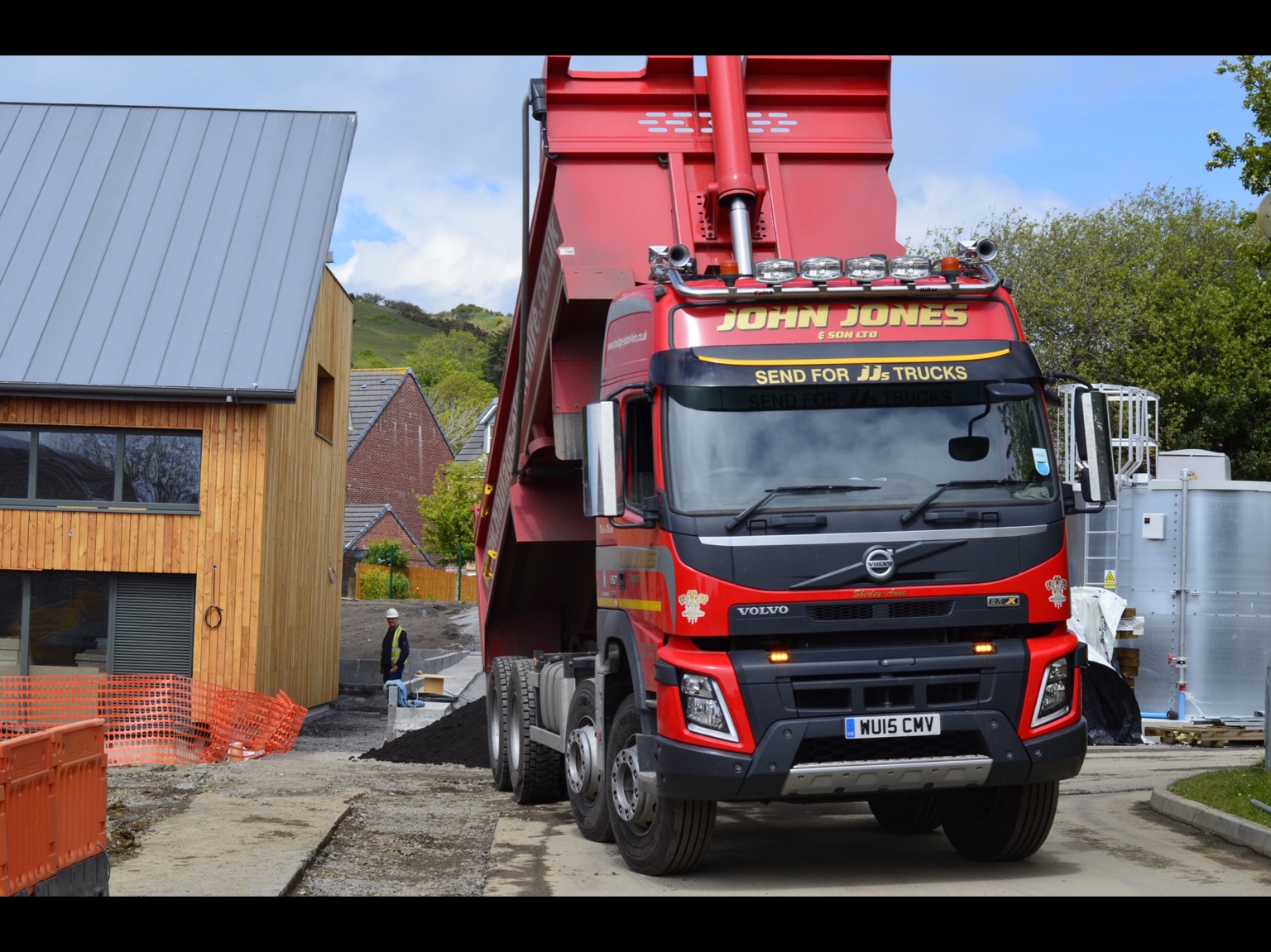 John Jones tipper lorry delivering topsoil